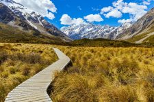 A scenic view of the snow-capped Mount Cook National Park in New Zealand
